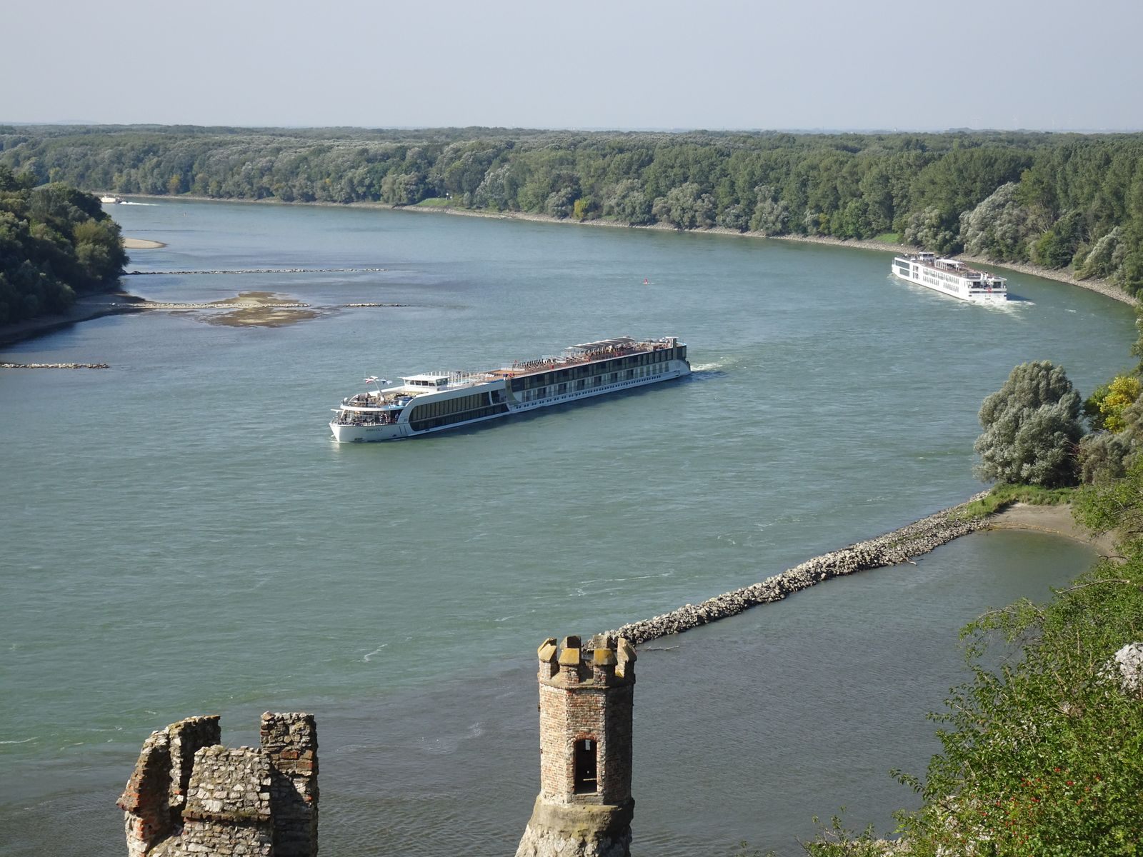 River cruise ships on the Danube below the ruins of Devín Castle near Bratislava, a stretch sailed by luxury river cruise lines Europe-wide
